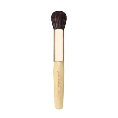 Multi-purpose Jane Iredale Dome Brush designed for smooth blending of bronzers and powders, featuring a sleek ergonomic handle.