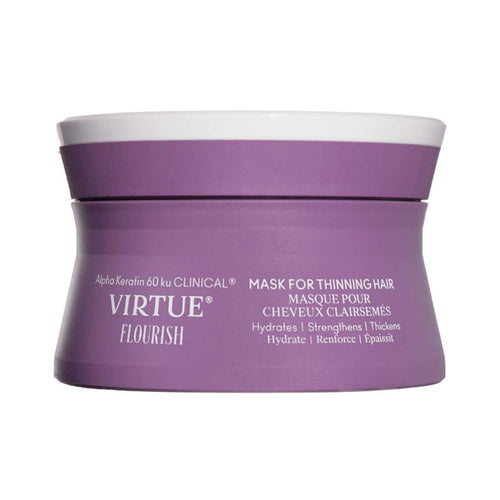 Virtue Flourish Hair Mask til tyndere hår vist i et stilfuldt lilla badekar, formuleret til at nære og genoprette tyndere hårstrå.