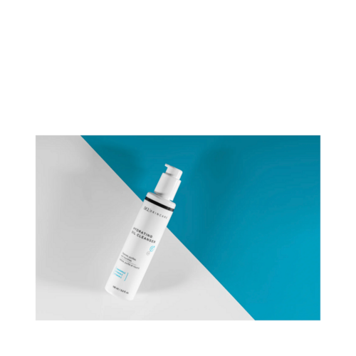 DCL Hydrating Oil Cleanser birtist á ská á stílhreinu bláu og hvítu yfirborði, fullkomið til að hreinsa og gefa andliti og hálsi raka.