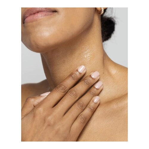 Close-up of woman applying VivierSkin Kine-C Serum to neck, illustrating daily skincare use for firming and moisturizing effects.