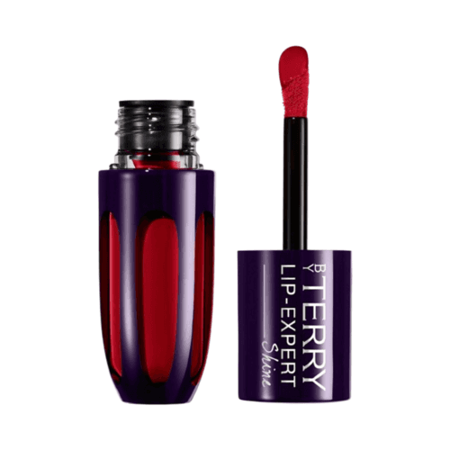 By Terry Lip-Expert Shine Liquid Lipstick in Fire Nude with glossy red pigment and sleek purple packaging, ideal for bold lip makeup looks.