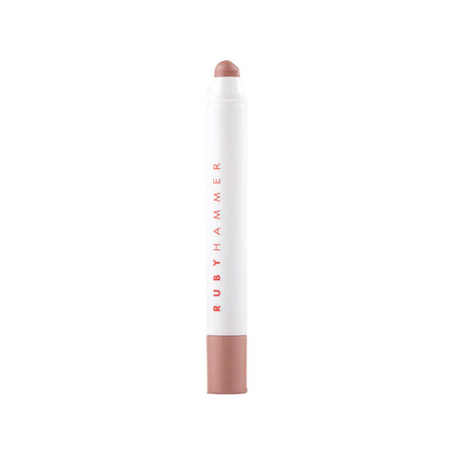 Ruby Hammer Lip Serum Balm in muted nude pink, perfect for subtle lip enhancement. Hydrating formula in sleek white packaging.