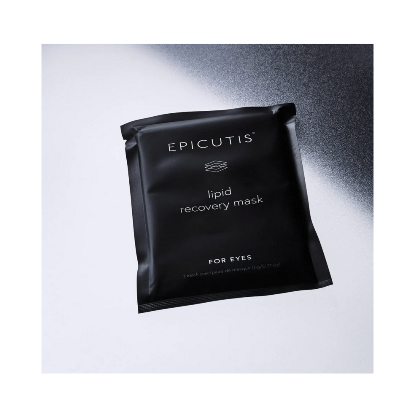 قناع العين Epicutis Lipid Recovery Eye Mask بزاوية على خلفية متدرجة، يعرض مستحضرات العناية بالبشرة الفاخرة لتجديد شباب العين.