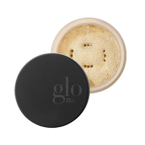 Glo Skin Beauty Setting Powder i gjennomskinnelig medium med myk-fokus finish, ideell for å sette foundation og redusere fine linjer.