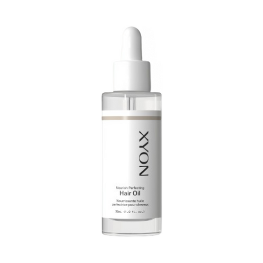 Θεραπεία XYON Perfecting Hair Oil Nourish Treatment σε διάφανο σταγονόμετρο, ιδανική για μαλακότητα και προστασία των ξηρών μαλλιών με βοτανικά εκχυλίσματα.