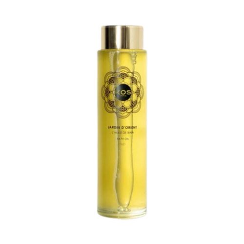 Kos Paris Oriental Garden Bath Oil σε ένα κομψό διαφανές μπουκάλι με χρυσαφένιες αποχρώσεις, ιδανικό για θρέψη της ξηρής επιδερμίδας με μεταξένιο, αρωματικό φινίρισμα.