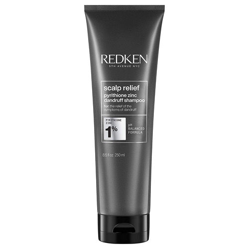 Redken Scalp Relief Shampoo with 1% pyrithione zinc for dandruff control; professional hair care solution in 250ml tube for scalp health.