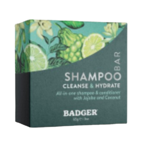 Badger Balms シャンプー バー - オーガニック成分を使用したオールインワン ヘアケア。柑橘類と花のアートワークが描かれたカラフルなボックスに入っています。