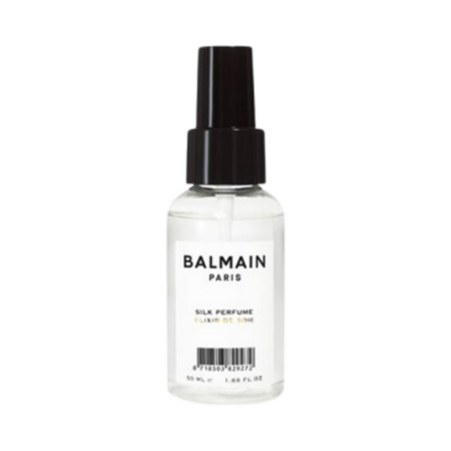 コンパクトな BALMAIN ヘア シルク パフューム 50ml スプレーは、外出先でも輝きと保護を提供します。 Infused with amino acids and nourishing oils.