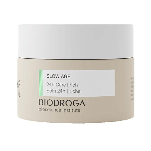 Biodroga Slow Age 24h Care - Runsas kasvovoide minimalistisessa beigessä pakkauksessa. Suunniteltu energisoimaan ja kosteuttamaan ikääntyvää ihoa risiiniöljyllä ja C-vitamiinilla.