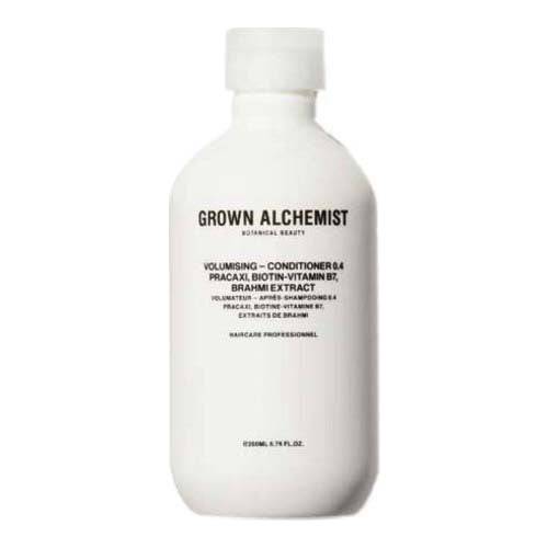 زجاجة بلسم تكثيف الشعر من Grown Alchemist تحتوي على البيوتين وفيتامين B7 لتعزيز وترطيب الشعر الناعم. مثالي للتألق والحجم في الشعر المسطح.