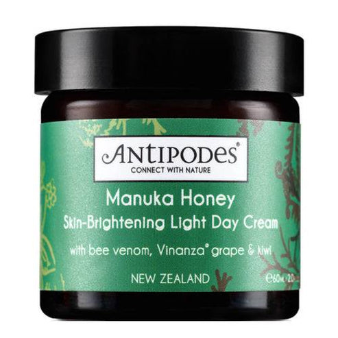 Antipodes Manuka Honey Cream in green jar packaging, a lightweight skin-brightening face cream for oily and combination skin types.