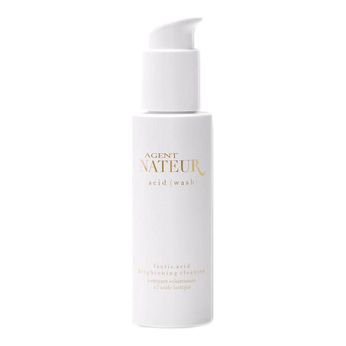 Agent Nateur Acid (Wash) Lactic Acid Brightening Cleanser in a sleek white pump bottle. Lactic acid cleanser for radiant, smooth skin care routine.