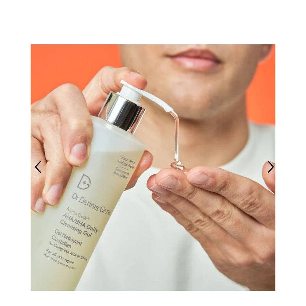 Man dispensing Dr Dennis Gross Alpha Beta Cleansing Gel from pump bottle, highlighting gel texture for daily skincare routine.