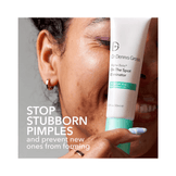 Smiling woman holding Dr Dennis Gross Spot Eliminator with text promoting its effectiveness in stopping stubborn pimples and preventing new ones.