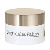 Diego dalla Palma Professional Anti-Dark Spot Illuminating Anti-Age Cream in a white jar with a metallic gold lid. Anti-dark spot cream reduces aging signs and evens skin tone.