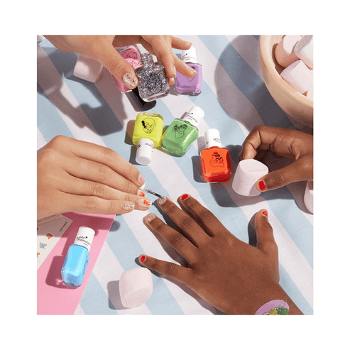 Children's hands painted with red and glitter Barbapapa Nail Polish - Kids Nail Polish by Manucurist, ideal for playful nail art.