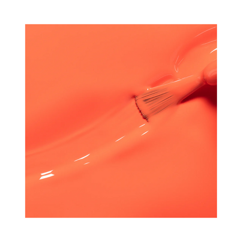 Child applying red Barbapapa Nail Polish - Kids Nail Polish by Manucurist, surrounded by playdough and glitter polish bottles.