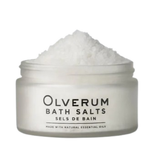 Olverum Bath Salts in a clear jar with white mineral crystals, available at eSkinStore for skin revitalization and relaxation.