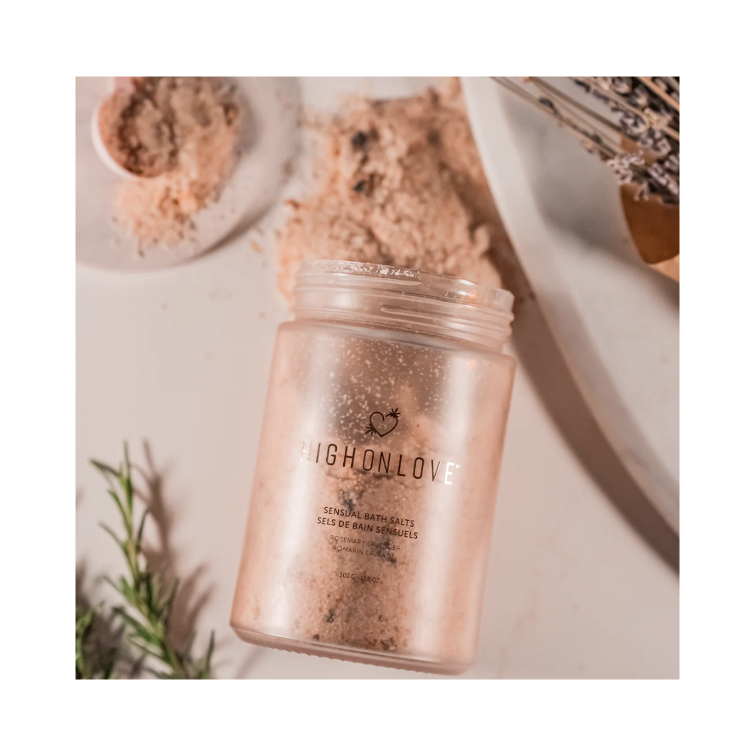 High on Love Bath Salts Body Treatment open jar with visible pink salts and herbs, perfect for indulgent body care and relaxation.