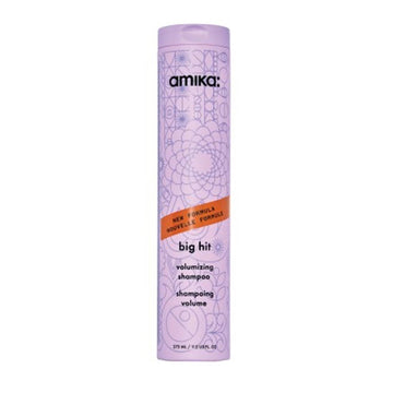 Amika Big Hit Volumizing Shampoo in a tall lavender bottle with floral design, ideal for boosting volume in fine hair types.