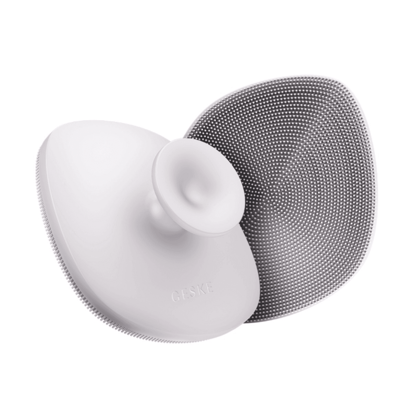 Geske Body Brush 4 in 1 in white with ergonomic design and silicone bristles for deep skin cleansing and exfoliation. Ideal for body skincare routines.