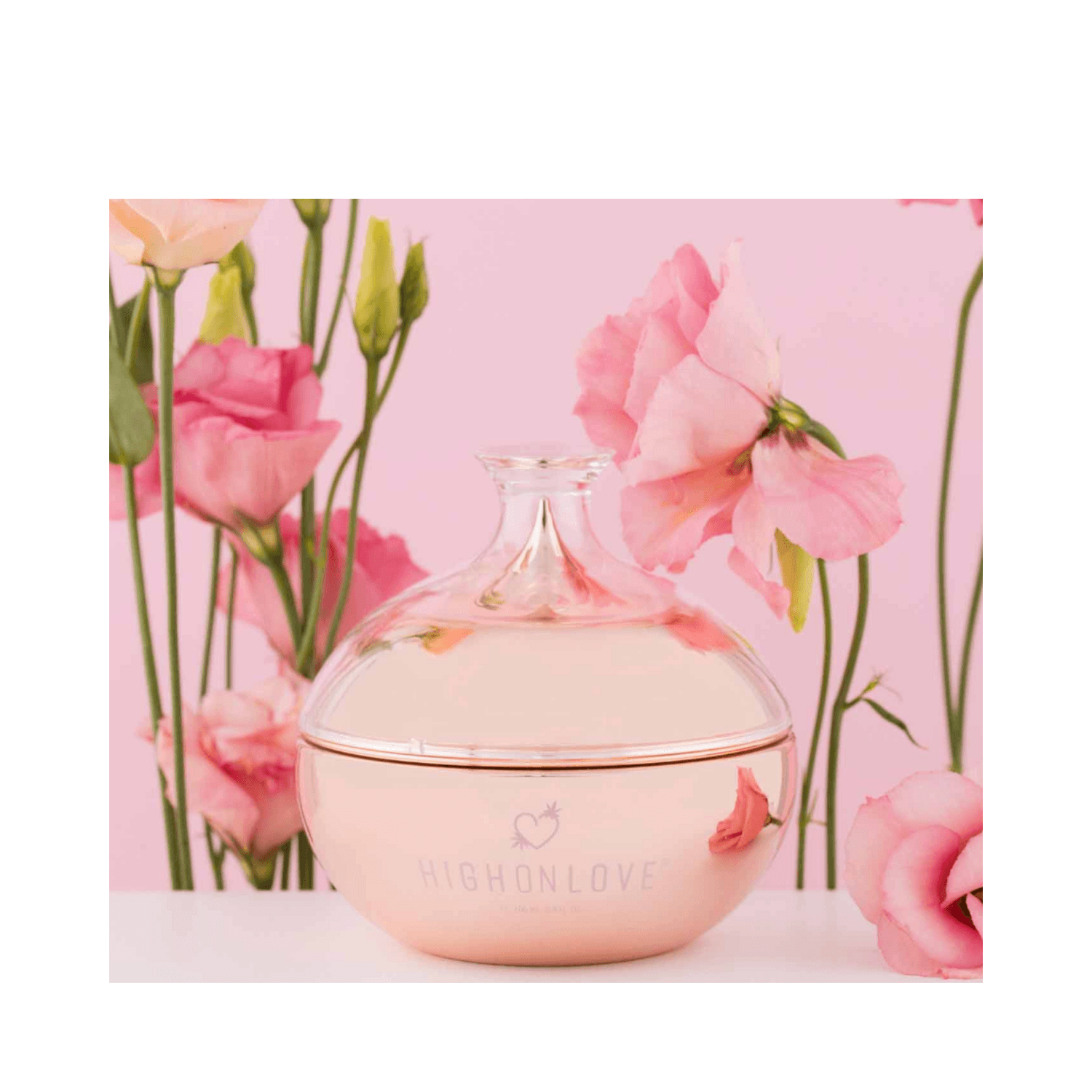 High on Love Body Butter Body Moisturiser displayed with pink flowers, luxury skincare for dry skin, 200 ml from eSkinStore.