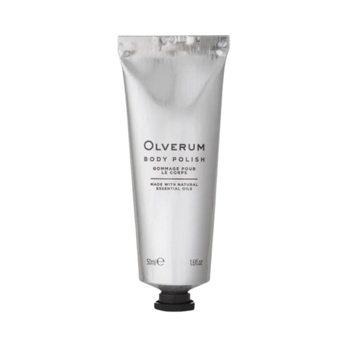 Hand squeezing Olverum Body Polish from silver tube. Lightweight exfoliating cream ideal for skin maintenance and hydration.