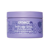 Amika Bust Your Brass Intense Repair Mask 250 ml jar in lavender packaging, designed for intense hydration and brass-neutralizing care.