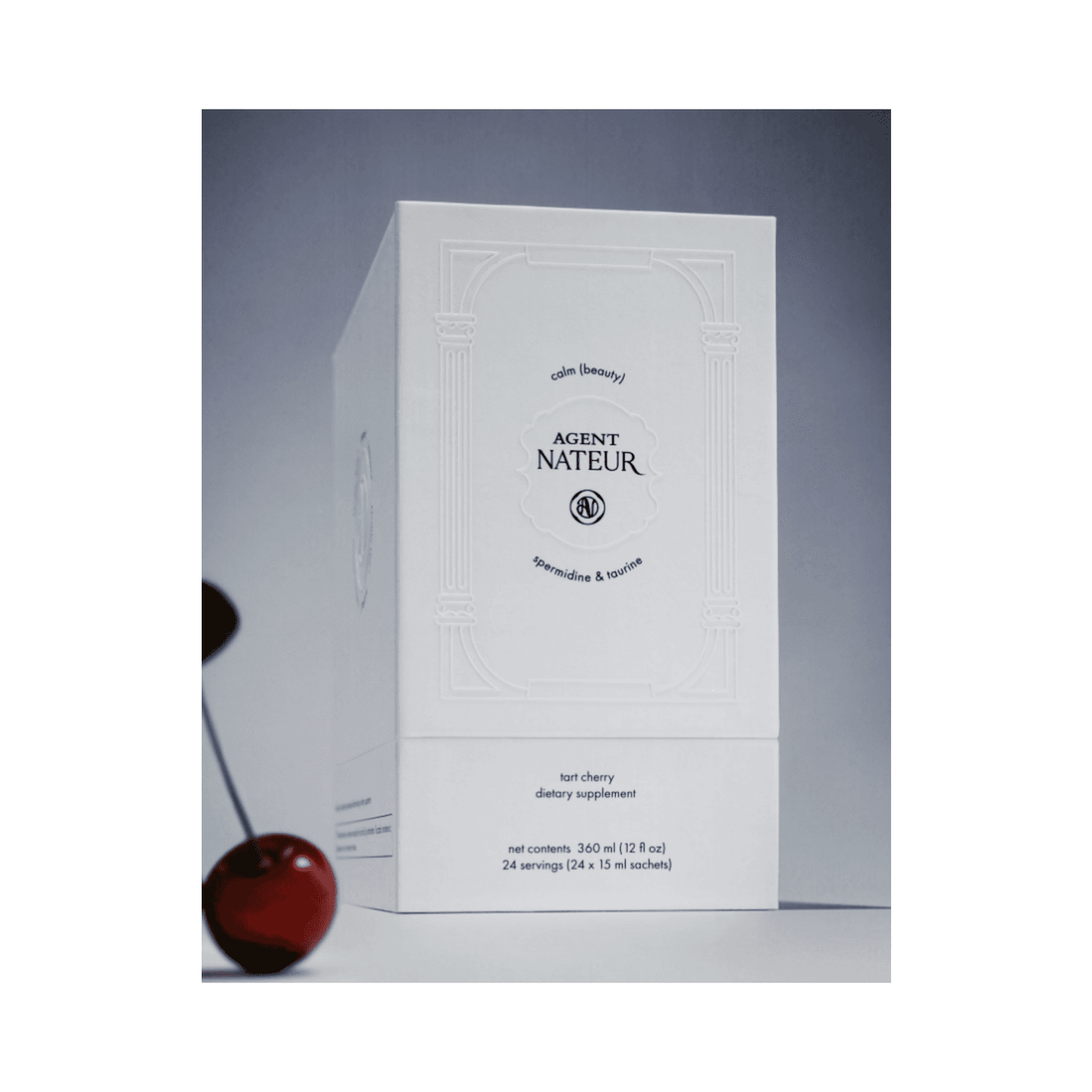 Agent Nateur Calm Supplement box with tart cherry and elegant branding, promoting beauty rest and anti-aging benefits with taurine and spermidine.