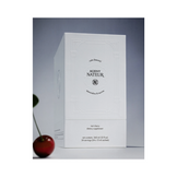 Lifestyle image of Agent Nateur Calm Supplement box with cherry accent, promoting restful sleep and skin health with taurine and spermidine blend.