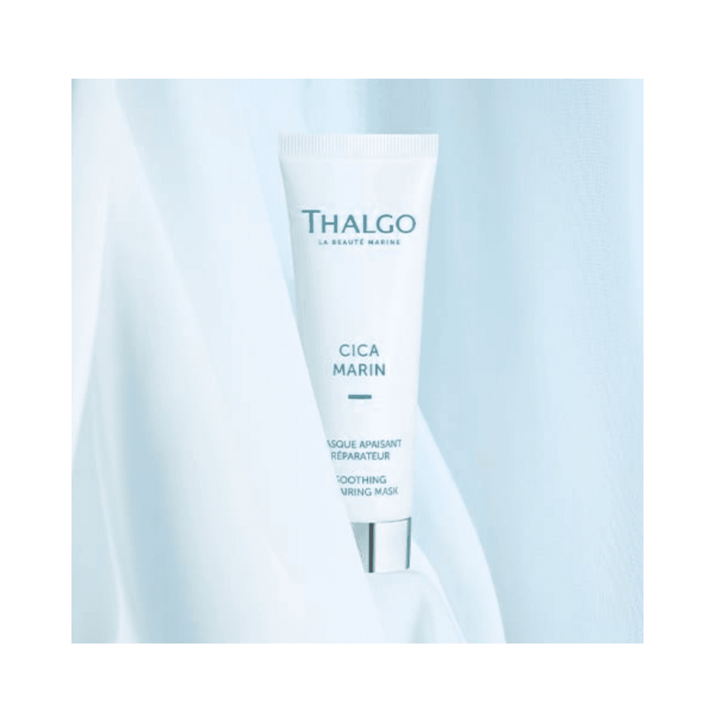 Thalgo Cica Marine Soothing Repairing Mask displayed in soft blue fabric, highlighting its calming effect for sensitive skin in skincare routines.