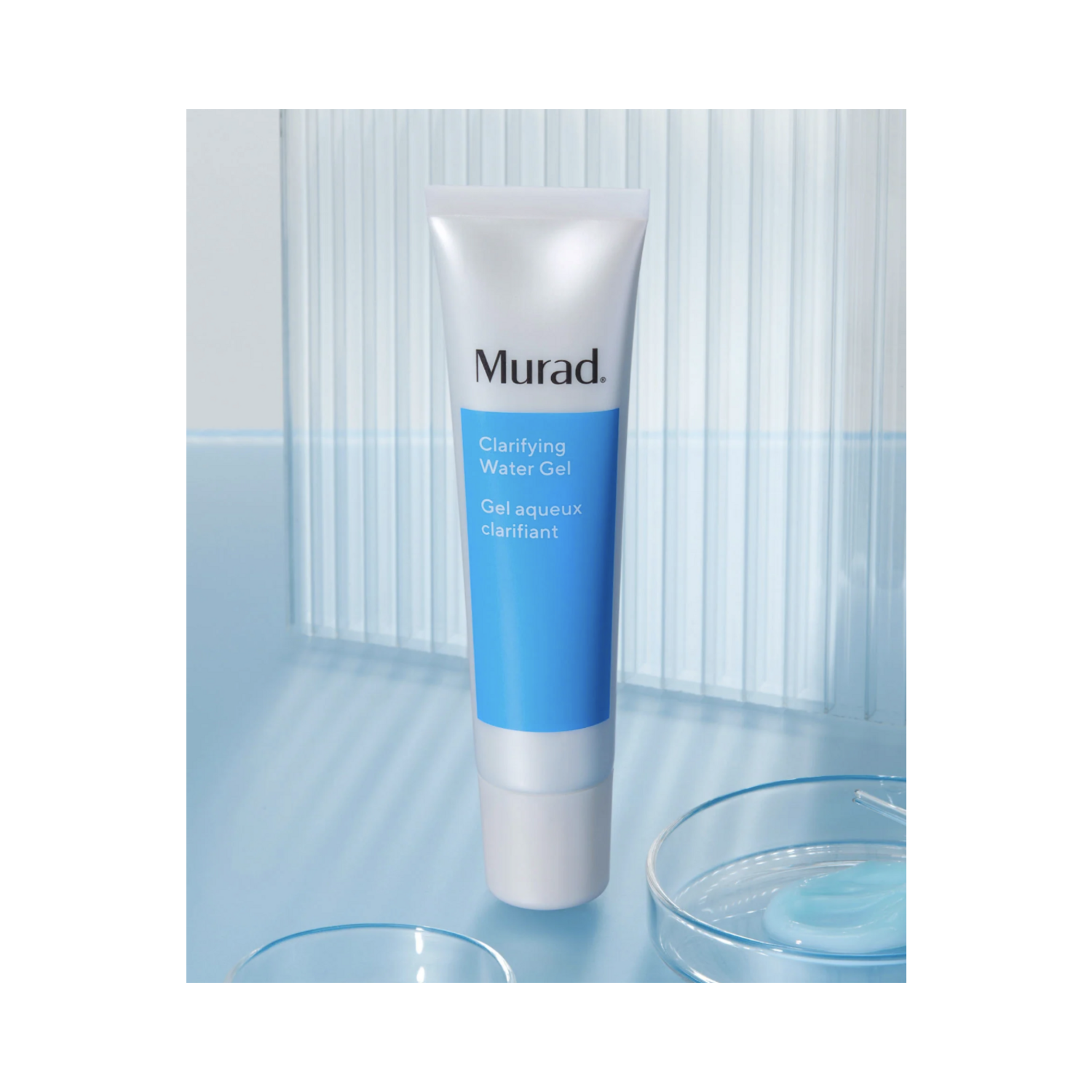 Murad Clarifying Water Gel on a glossy blue background with gel swatch, emphasizing its hydrating and purifying skincare benefits.