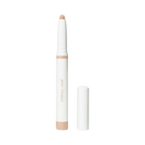 Jane Iredale Eye Shadow Stick in taupe brown with cap off, ideal for contouring or defining eyes. Cream-to-powder formula ensures smooth application.