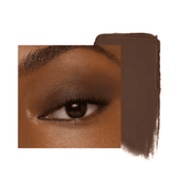 Model wearing Jane Iredale Eye Shadow Stick in nude beige, showing a natural, matte eye look perfect for daily wear or as a base shade.