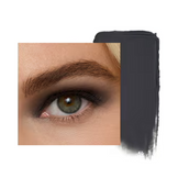 Model wearing Jane Iredale Eye Shadow Stick in olive shimmer, creating a bold, earthy eye look with a luminous finish.