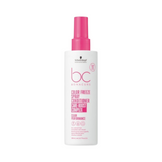 Schwarzkopf Bonacure Color Freeze Spray Conditioner with Care+ Boost Complex, designed for color protection and hair shine in a sleek pink and white bottle.