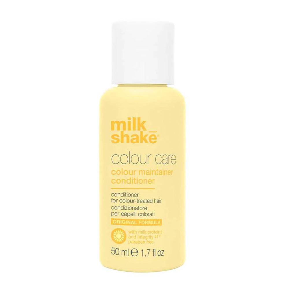 Travel-size milkshake color maintainer conditioner in yellow bottle, ideal for maintaining vibrant hair color and nourishing treated hair.