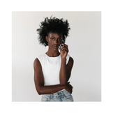 Model holding Circadia Counter A.G.E. Face Serum, showcasing its lightweight formula for mature skin. Available at eSkinStore Canada.