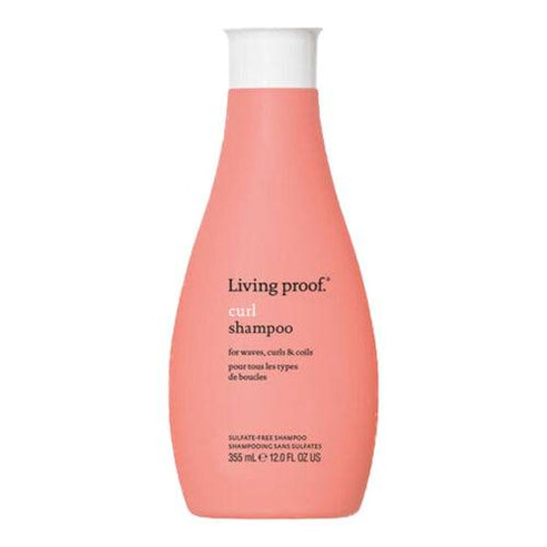 Curl Shampoo by Living Proof for waves, curls, and coils, featuring Healthy Curl Complex in sleek coral packaging for hair cleansing.