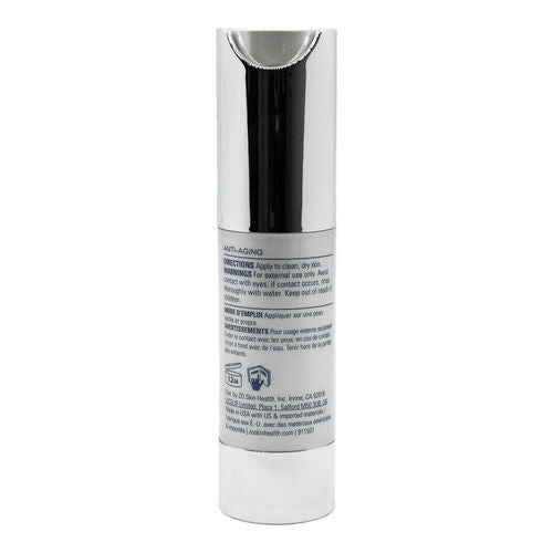 Back of ZO Skin Health Daily Power Defense travel size bottle displaying usage instructions and anti-aging product details for daily facial care.