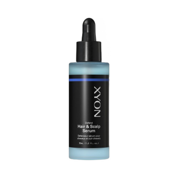 XYON Defend Hair Serum in 30mL dropper bottle for scalp treatment and hair growth boost. Hydrating formula with caffeine and hibiscus extract.