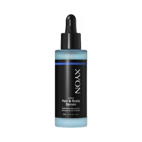 XYON Defend Hair Serum in 30mL dropper bottle for scalp treatment and hair growth boost. Hydrating formula with caffeine and hibiscus extract.