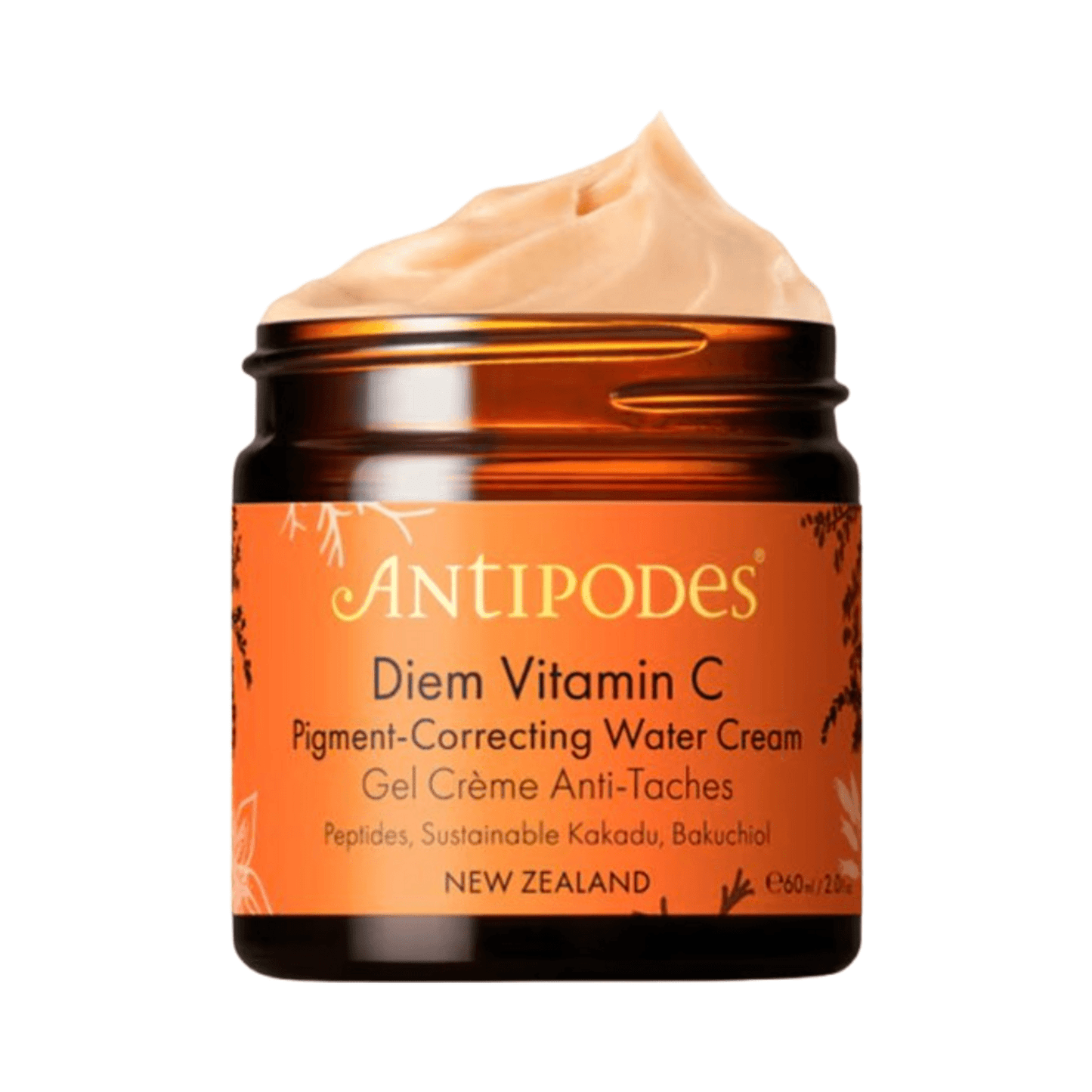 Antipodes Diem Vitamin C Pigment Correcting Cream in amber jar with peach-toned formula, ideal for refining skin tone and correcting pigmentation.