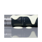 CosMedix Duo 1% Retinoid Night Treatment bottle with serum drips, emphasizing its rich formula for mature and wrinkled skin.