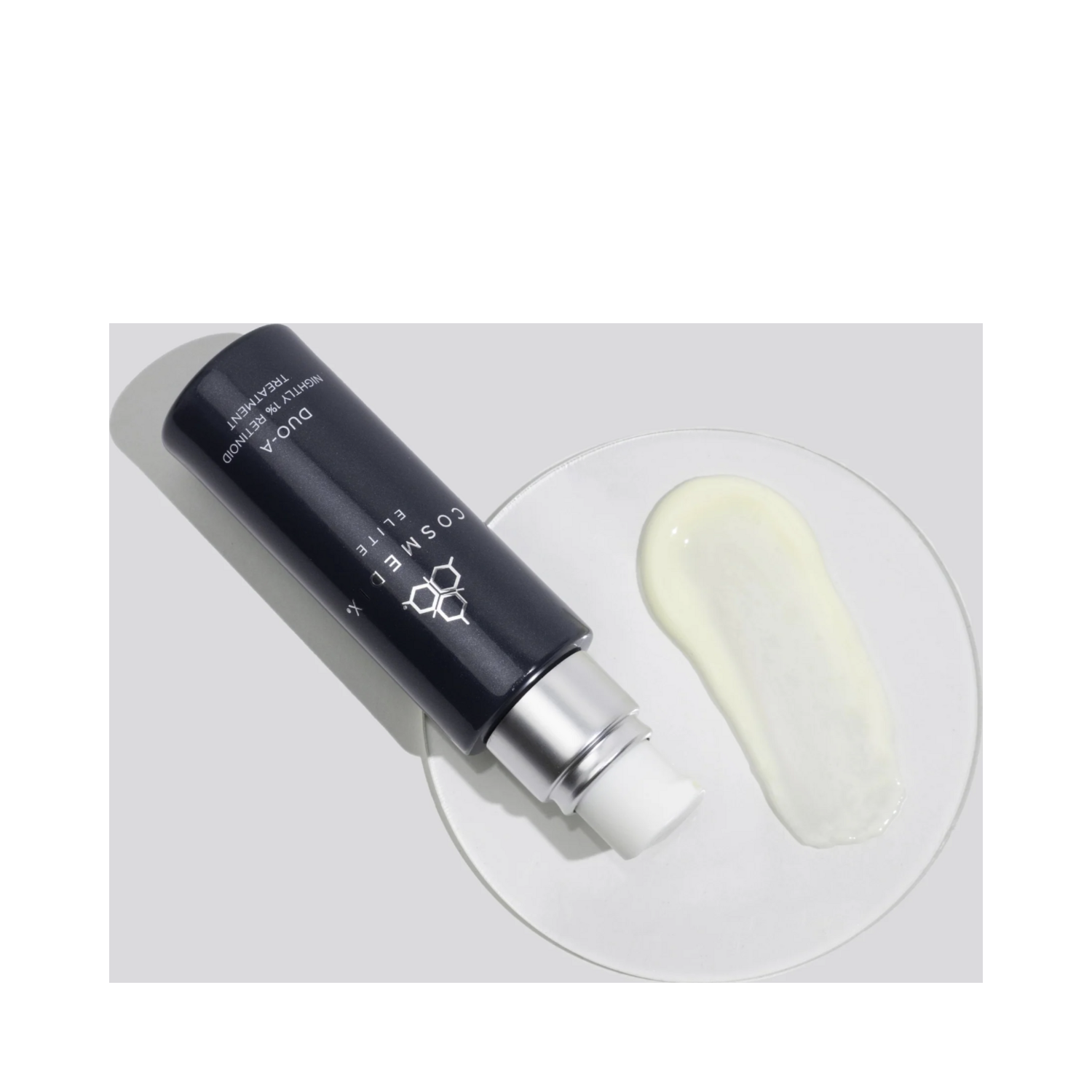 CosMedix Duo 1% Retinoid Night Treatment with serum swatch, demonstrating creamy texture for targeted face and neck treatment.