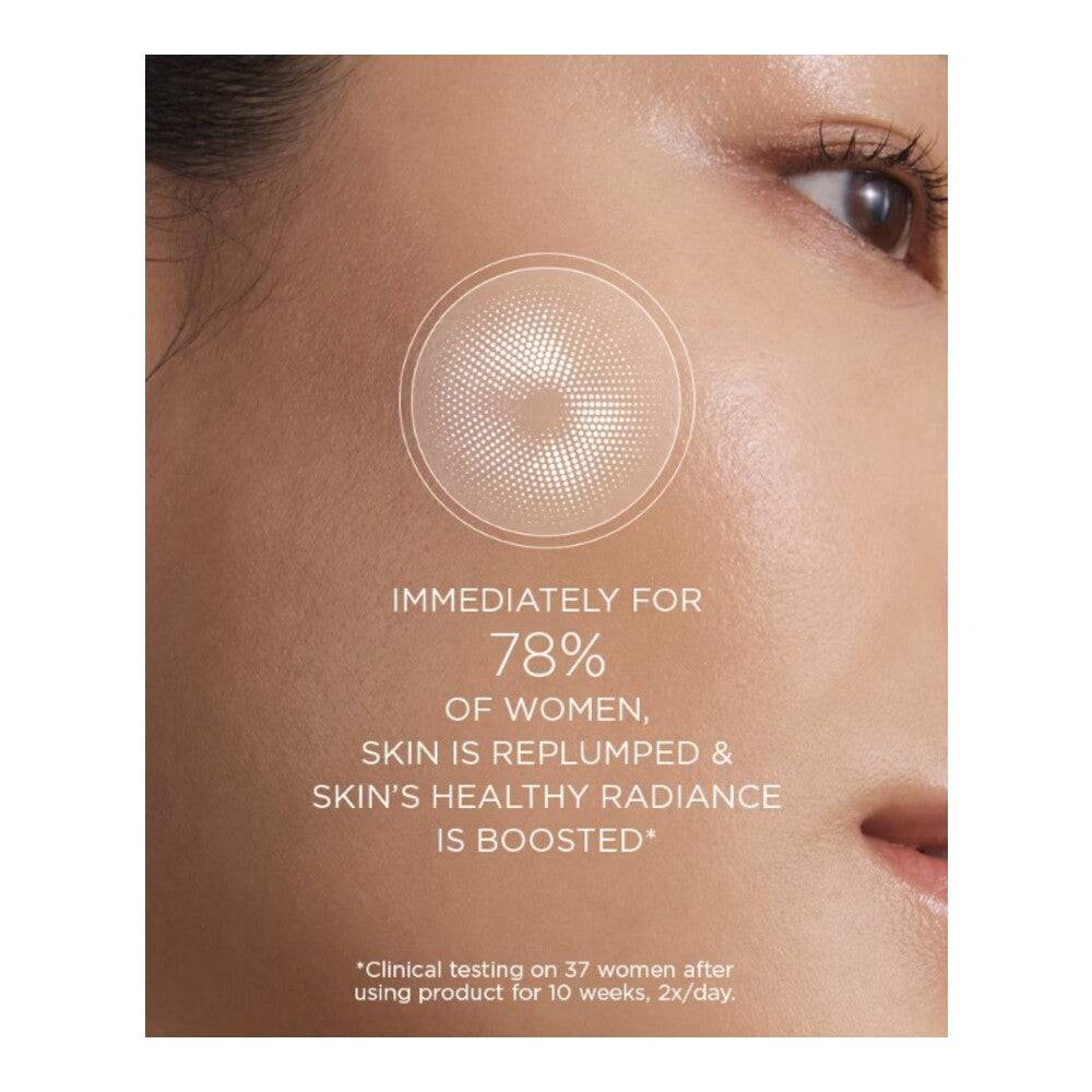 Close-up of a woman’s cheek showing results of Darphin Eclat Micro Serum with text highlighting 78% saw plumper, more radiant skin instantly.