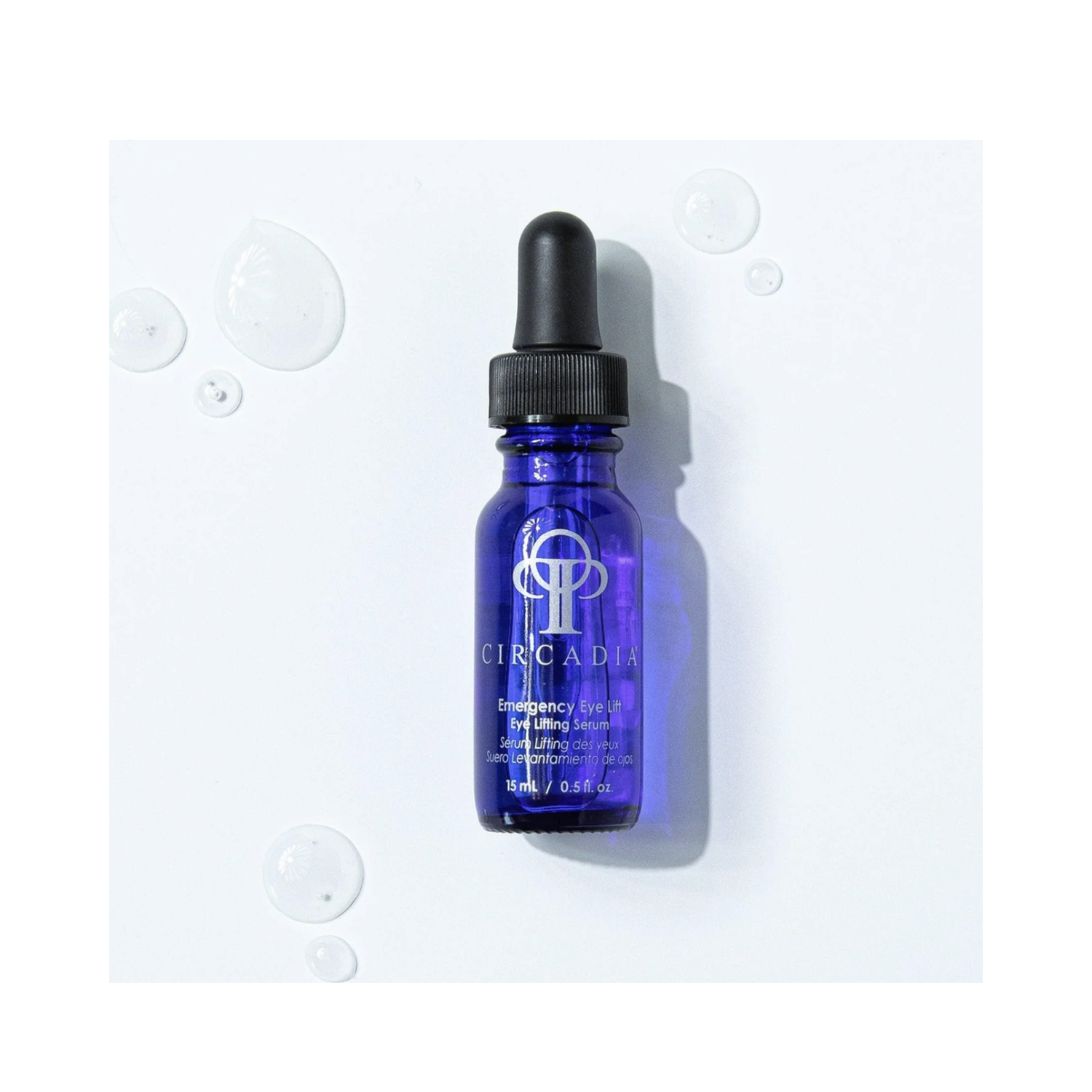 Circadia Emergency Eye Lift for Youthful Eyes shown with gel droplets, highlighting its hydrating and fine line-plumping formula.
