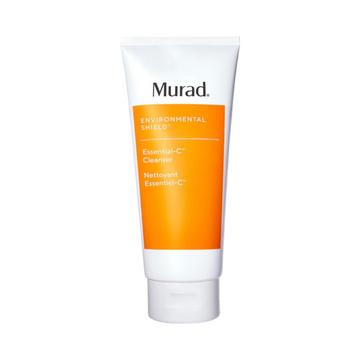 Murad Essential-C Cleanser face wash in a white and orange tube, designed to remove impurities and boost skin radiance for dry skin types.
