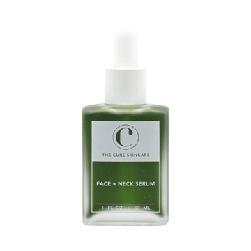 The Cure Skincare Face + Neck Serum in a green glass bottle with dropper, enriched with sea moss and collagen for dry and mature skin care.